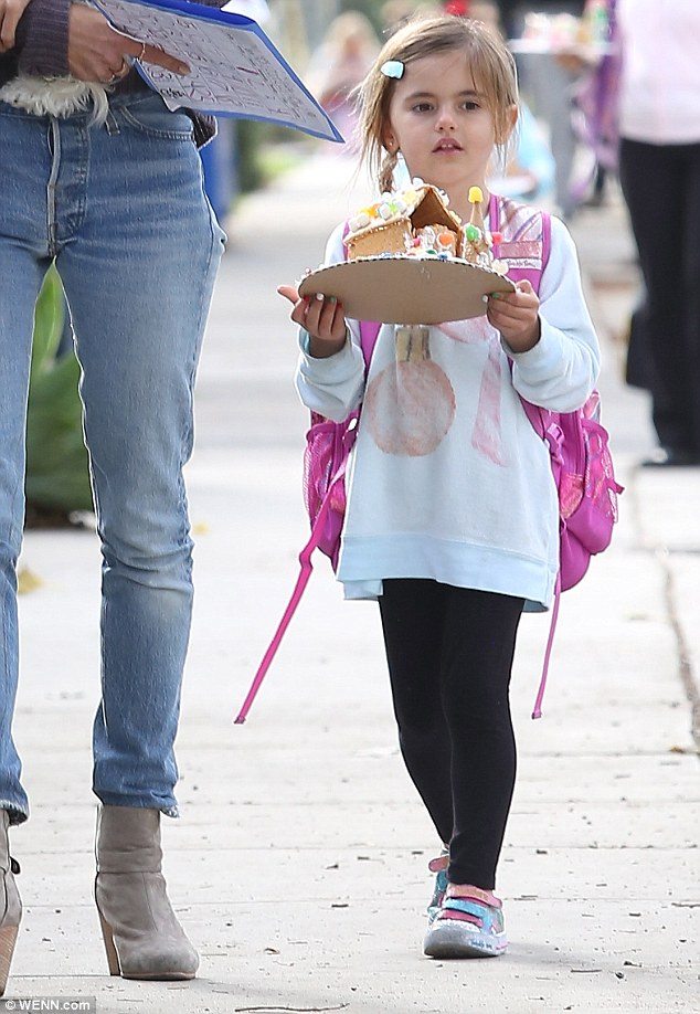 Alessandra Ambrosio's daughter Anja spotted in Wildfox pink perfume sweatshirt | via DailyMail UK